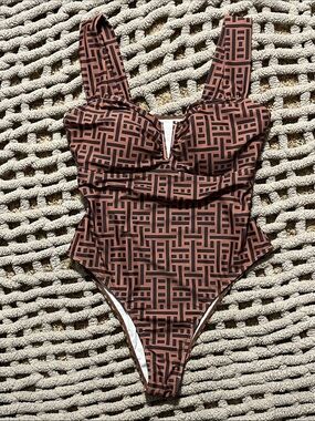 Pretty one piece swimsuit. Brown and black with sexy V cleavage and high hip cut